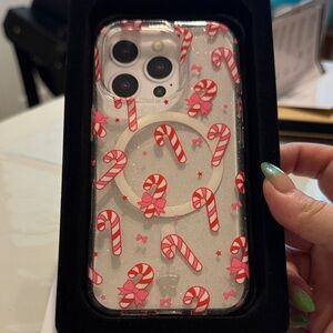 Velvet Caviar Clear Candy Cane iPhone Case with Red and Pink Accents